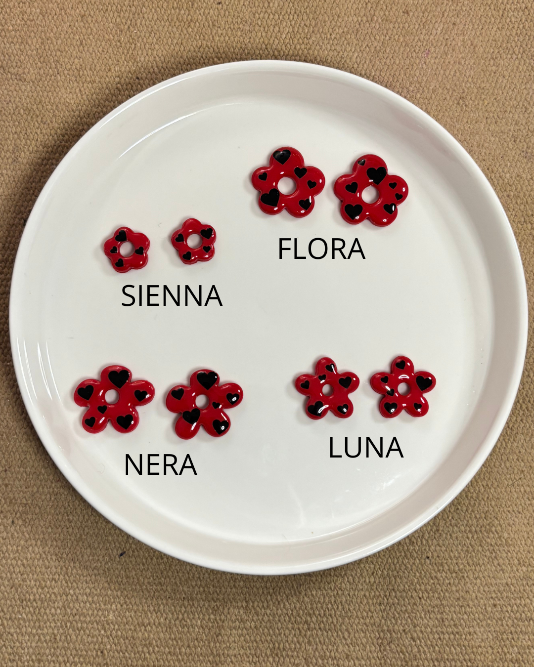 Pampilles rouges cœurs noirs